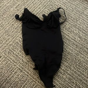 Skims seamless sculpt thong bodysuit in black